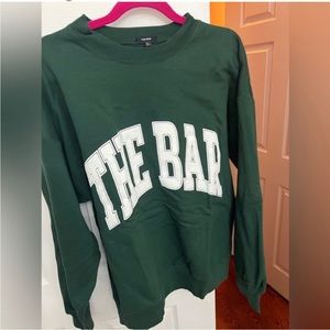 The bar sweatshirt green and white size large